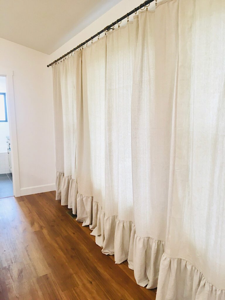 diy drop cloth curtains with a ruffle on a large window