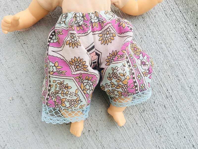 doll pants sewing pattern on a baby doll