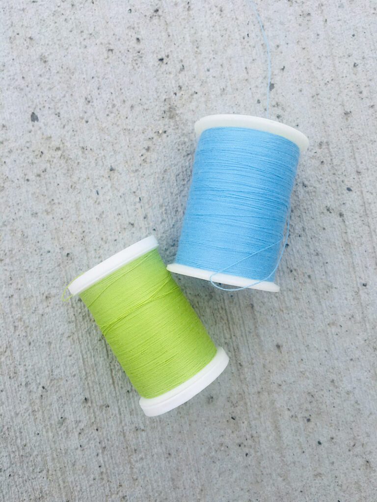 two spools of thread