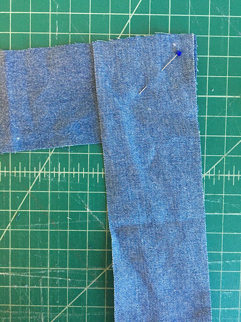 aligning the fabric strips to connect them