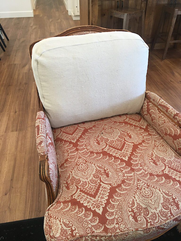 cushion on cover back on chair