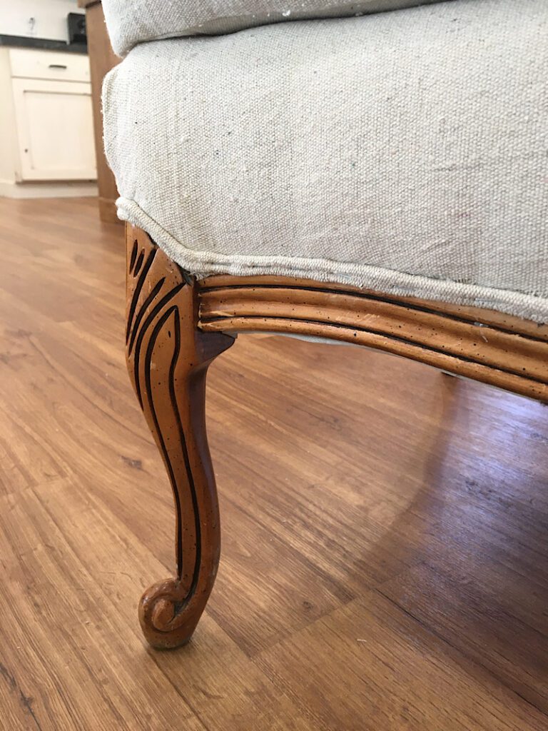 white piping trim on a chair reupholstery