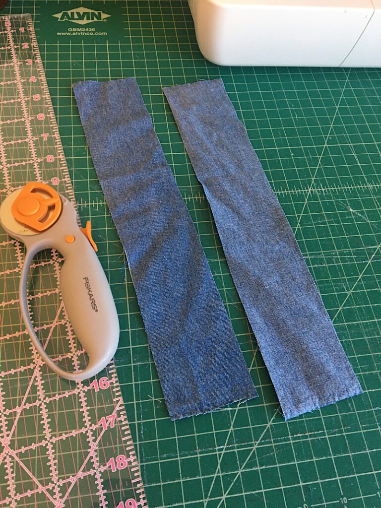 cutting strips of fabric to make double piping with