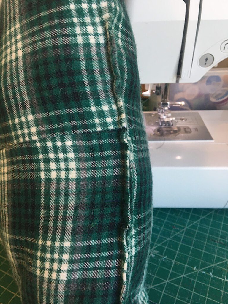 sewing the gap closed on the christmas tree pillow