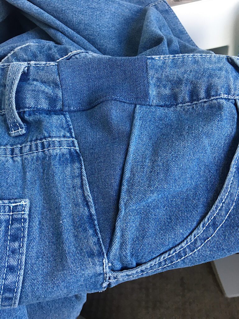 sewing the waistband on jeans to make them bigger