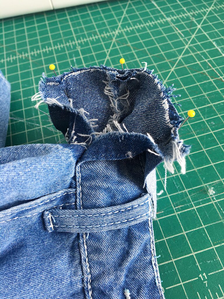 pinning the rectangle to the waistband of the pants