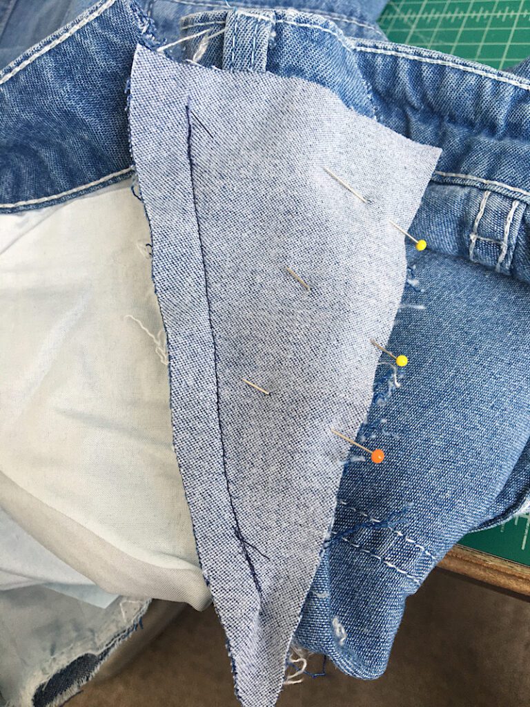 inside of the waistband gusset on jeans.