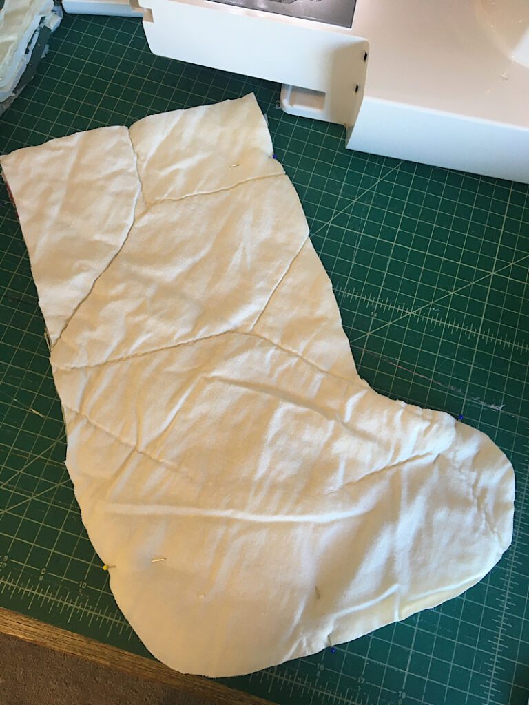pinning the front and back of quilt stocking together