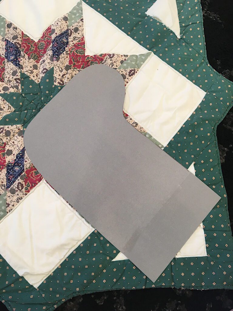 Place the stocking pattern on the quilt