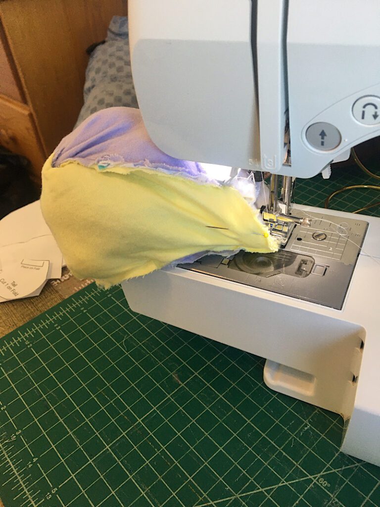 sewing the head to the body