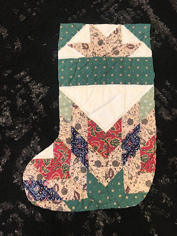 christmas stocking cut out from a quilt upcycle