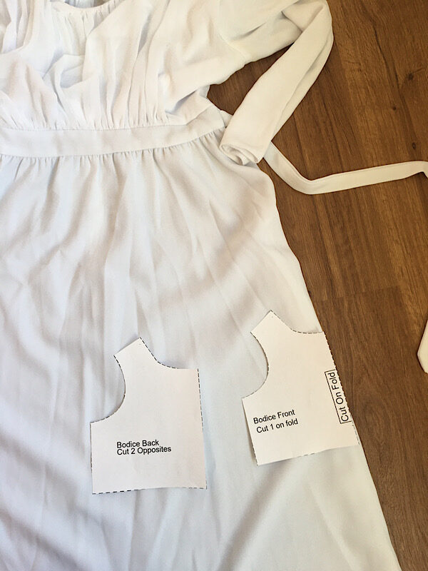 cutting christening gown bodice from skirt of wedding dress