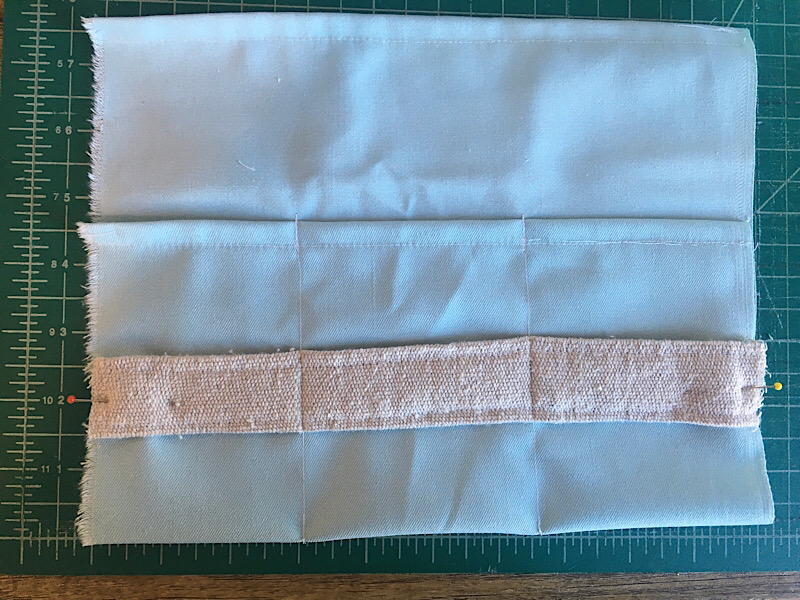 Sew lines through tool bag to make pockets