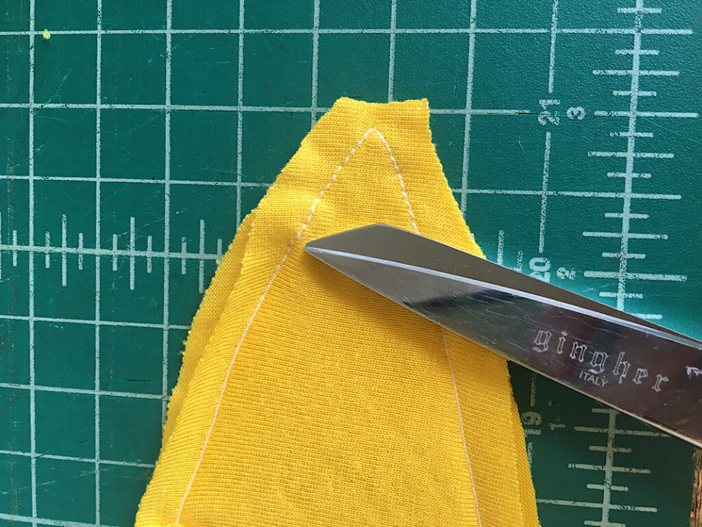 cutting excess fabric off tie
