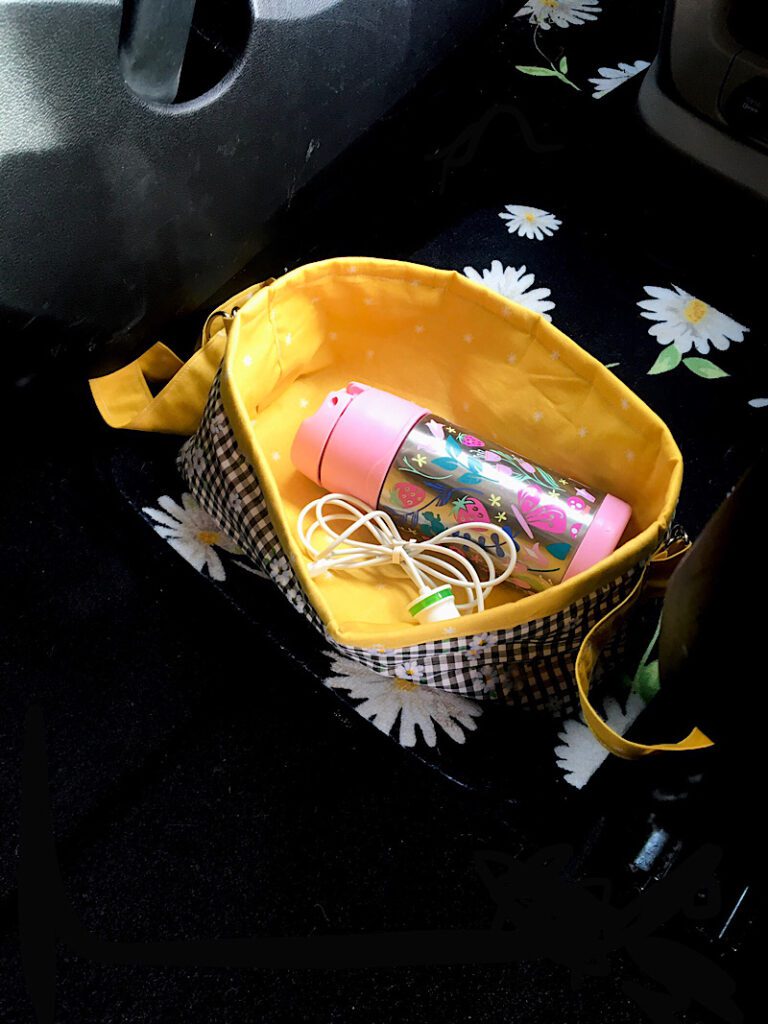 Car organizer basket with waterbottle