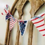 red white and blue bunting garland made from fabric scraps