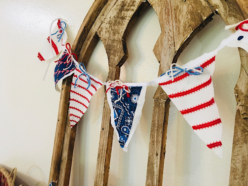 red white and blue bunting garland made from fabric scraps