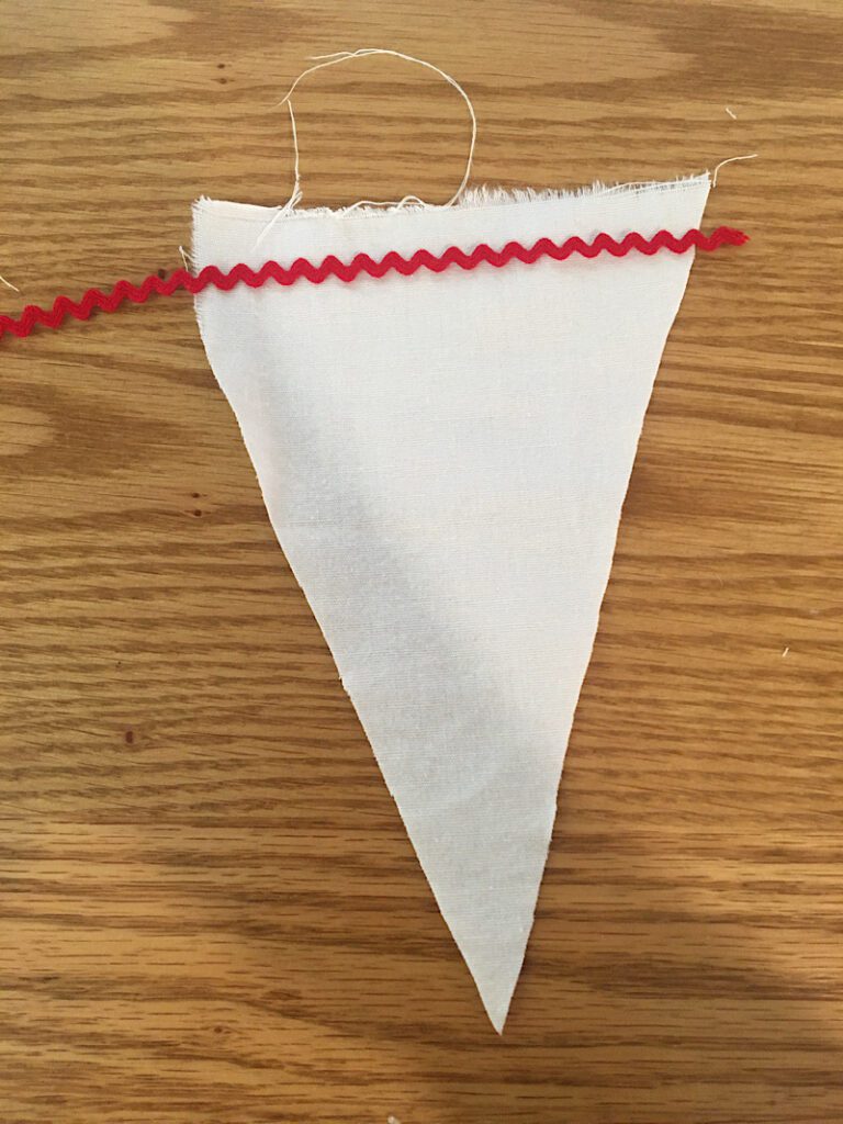 sewing stripes on the triangles