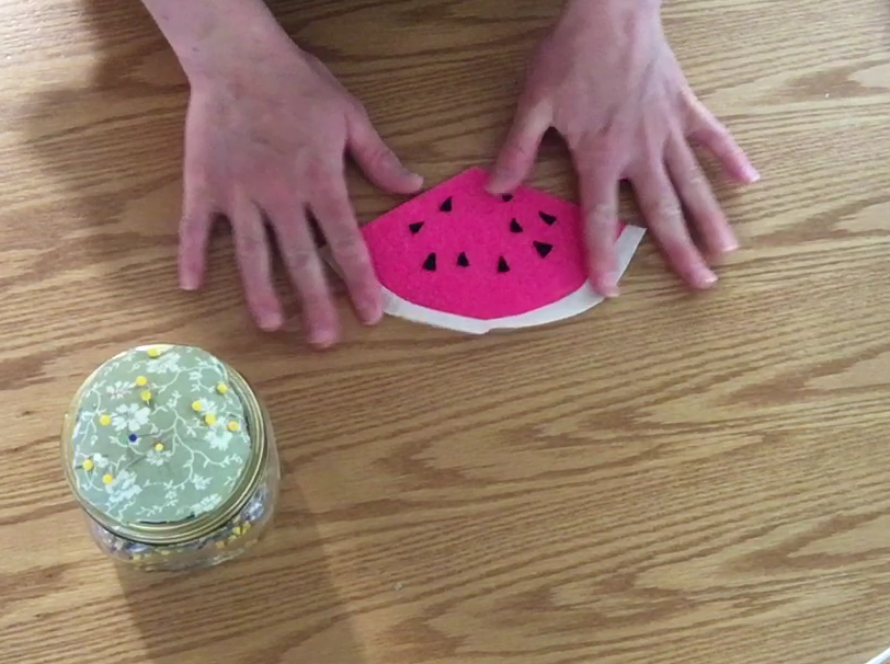 pressing watermelon flat