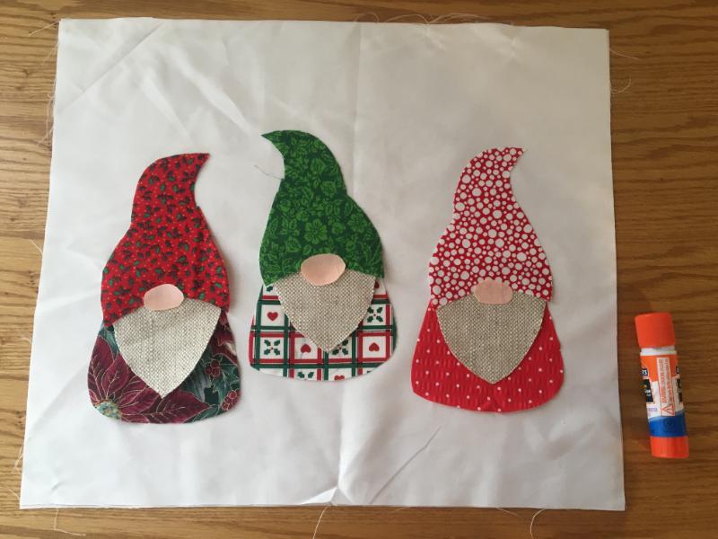 gnome applique pieces on fabric