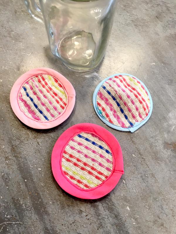 diy upcycled towel coasters with a cup