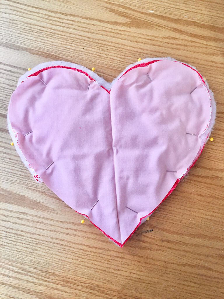 back of heart hot pad with pins