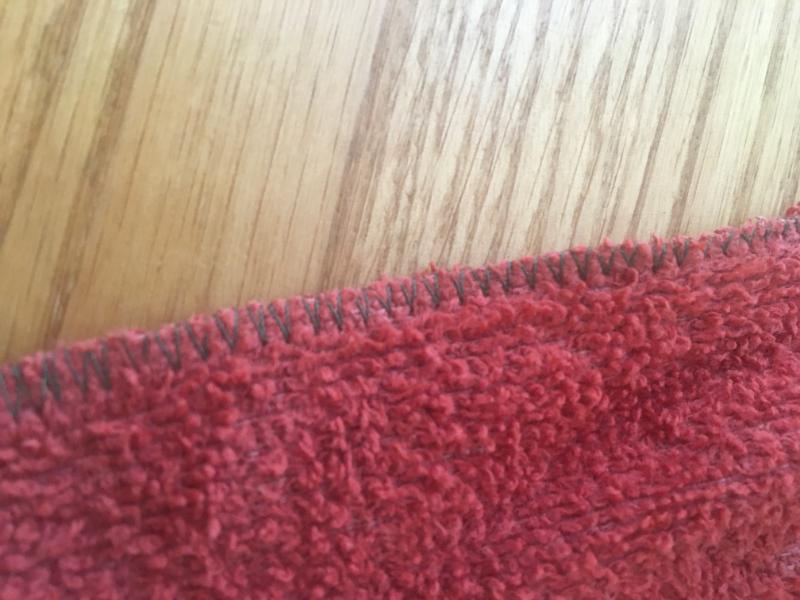 zig zag stitch on the edge of a rag made from a towel