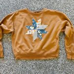 brown sweatshirt with DIY 8 pointed star quilt block applique on front